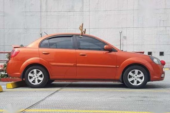 Kia Rio 1.4 AT Sunset Orange 2010 For Sale 