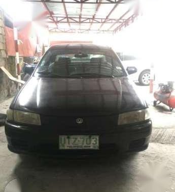 Mazda Familia 323 1997 AT Black For Sale 