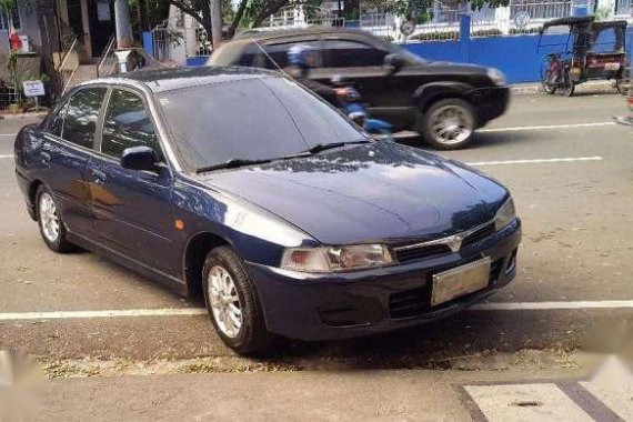 Lancer GLXI 99 AT tiptronic pizza