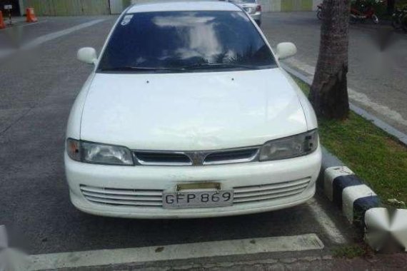 White Car-Mitsubishi Lancer 1995 mdl for sale 