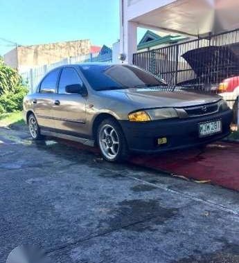 99 Mazda 323 rayban GOOD AS NEW FOR SALE