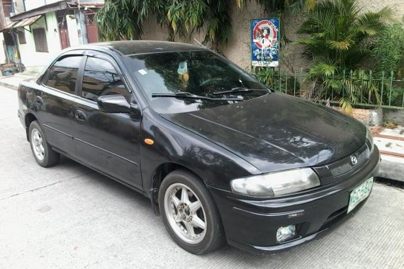 Good as new Mazda 323 1999 for sale