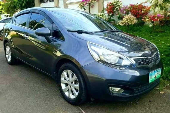Kia Rio 2012 Gold MT Rush for sale