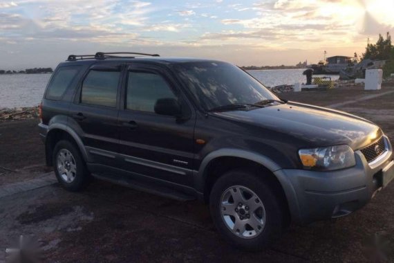 Ford Escape 4x2 XLT Black 2006 acquired low mileage 250k negotiable