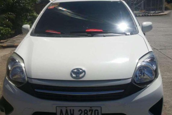 Toyota wigo 2014 e manual white for sale 