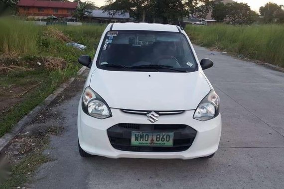 Suzuki Alto Deluxe 2014 acquired top of d line