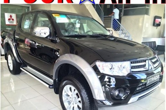 Almost brand new Mitsubishi Strada Diesel 2014