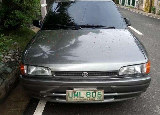 MAZDA 323 1997 model Excellent condition with ac plus sports mags