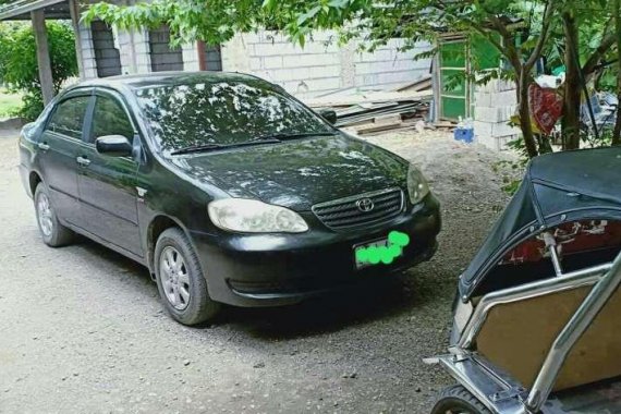 Toyota Corolla Altis Black 2004 Model For Sale 