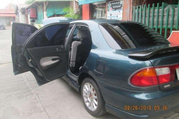 Rush Sale Mazda 323 sedan quality 2nd hand 1999