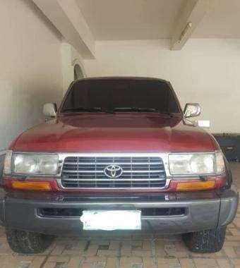 SELLING red 1997 Toyota Land Cruiser 80