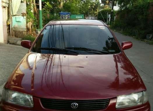 Selling lady driveN Mazda Familia 323 1996 