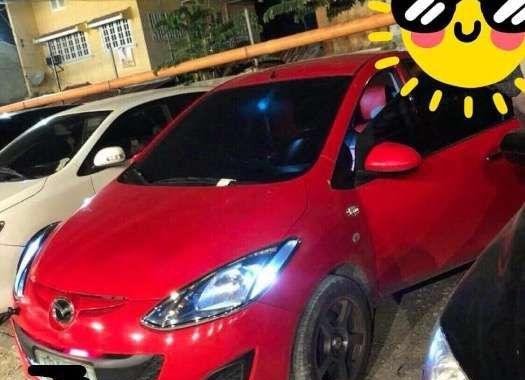 For sale Mazda 2 red hatch back Model 2011