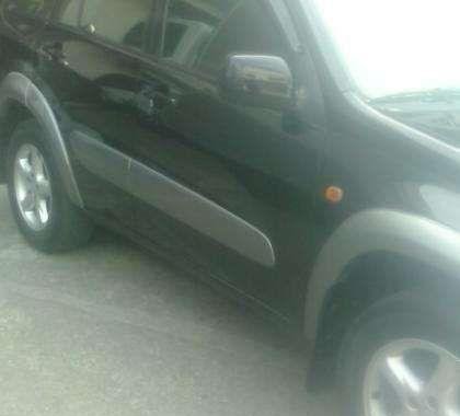 Toyota RAV4 year model 2001 color black 