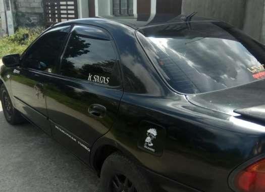 Mazda 323 1997 model FOR SALE