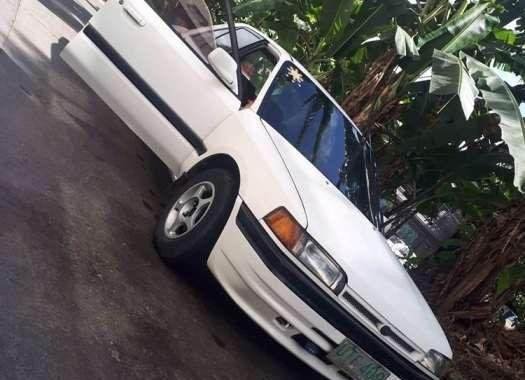 Mazda 323 Familia 97 model MT