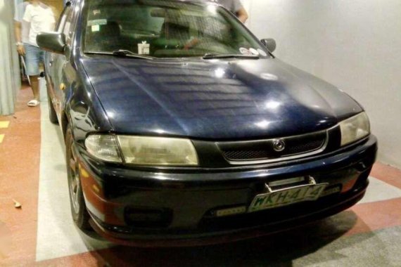 Mazda Familia 323 (Gen 2.5) 2000 model