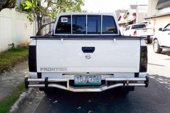 2012 Nissan Frontier Price: NEG M/T White