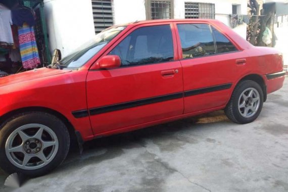 Mazda 323 sedan Good running condition