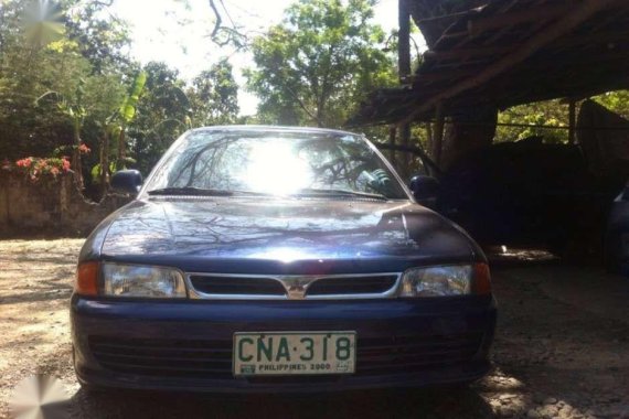 Mitsubishi Lancer color blue glxi all power. 1996 model