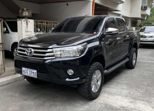 Selling Toyota hilux 4x2 G Automatic diesel Black 2016