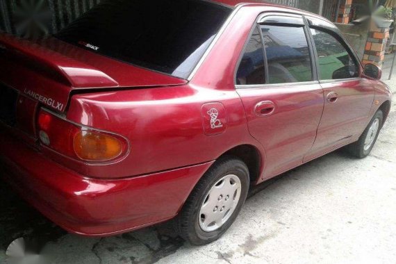 SELLING MITSUBISHI Lancer Glxi sale or swap 95