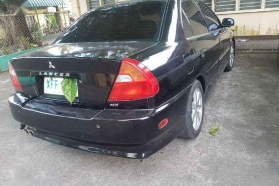 Mitsubishi Lancer automatic 2002 mx for sale 