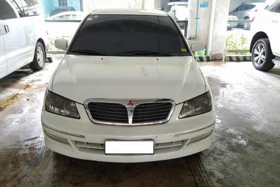 White Mitsubishi Lancer 2004 Sedan at 149000 km for sale