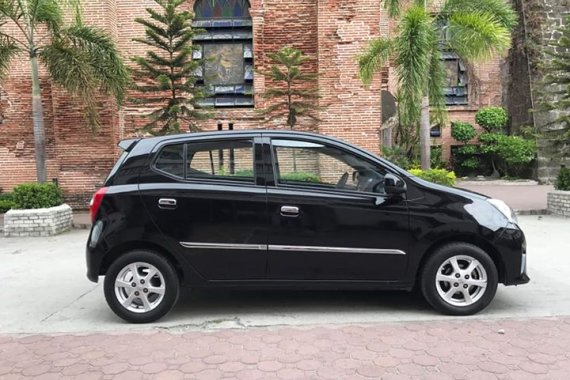 Black 2015 Toyota Wigo at 54000 km for sale 