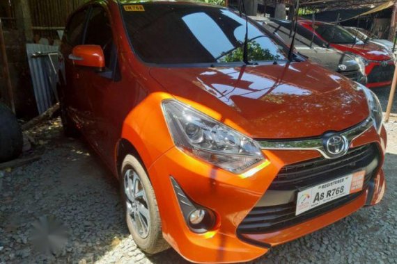 Selling Orange Toyota Wigo 2019 Manual Gasoline in Quezon City