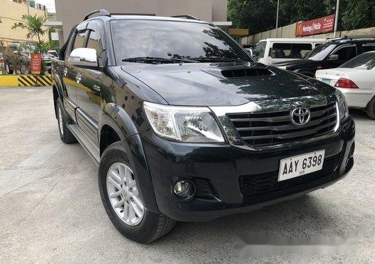 Selling Black 2014 Toyota Hilux at 100000 km 