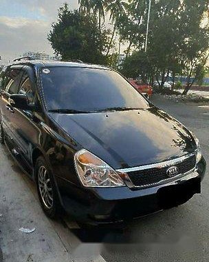 Black Kia Carnival 2013 at 75000 km for sale