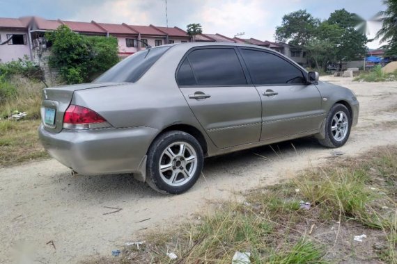 Selling 2004 Mitsubishi Lancer for sale in Consolacion