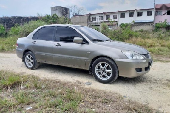 Selling 2004 Mitsubishi Lancer for sale in Consolacion