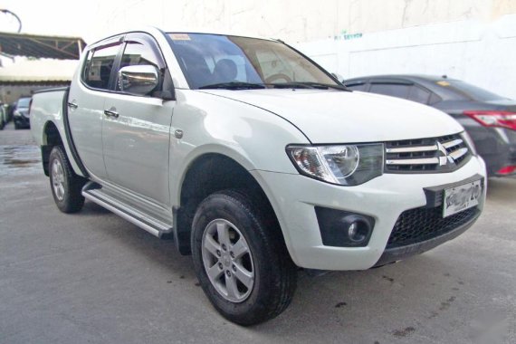 Selling 2nd Hand Mitsubishi Strada 2014 Automatic Diesel in Mandaue