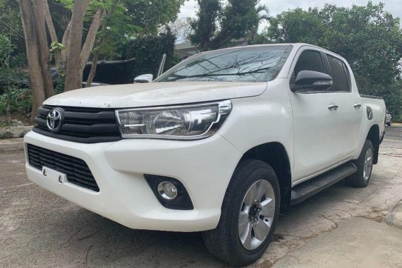 Selling White Toyota Hilux 2016 Manual Diesel in Quezon City