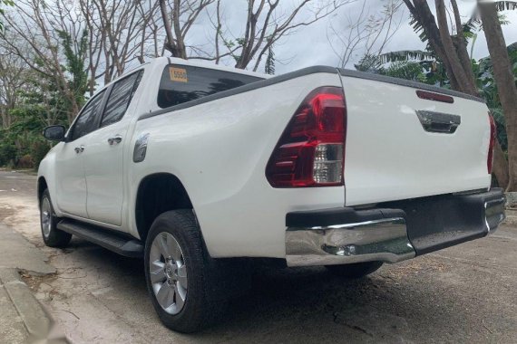 Selling White Toyota Hilux 2016 Manual Diesel in Quezon City