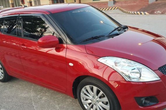 Selling Red Suzuki Swift 2014 Manual Gasoline in Trece Martires