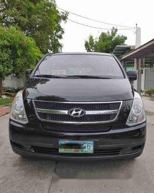 Black Hyundai Grand Starex 2014 at 40000 km for sale