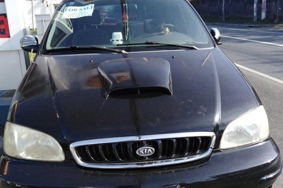 Selling Black Kia Carnival 2001 120000 km in Lipa