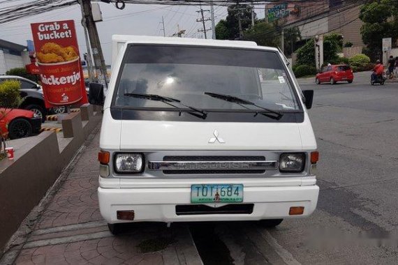 Selling White Mitsubishi L300 2012 at 70000 km in Quezon City