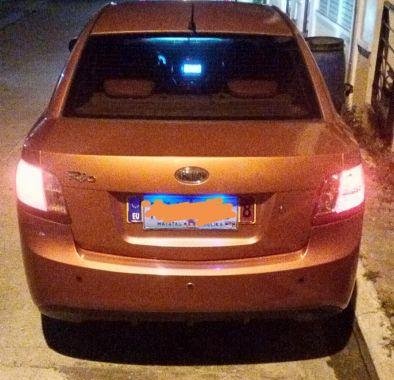 Selling Orange Kia Rio 2011 Automatic Gasoline in Quezon City