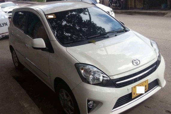 Selling White 2015 Toyota Wigo Automatic at 15000 km