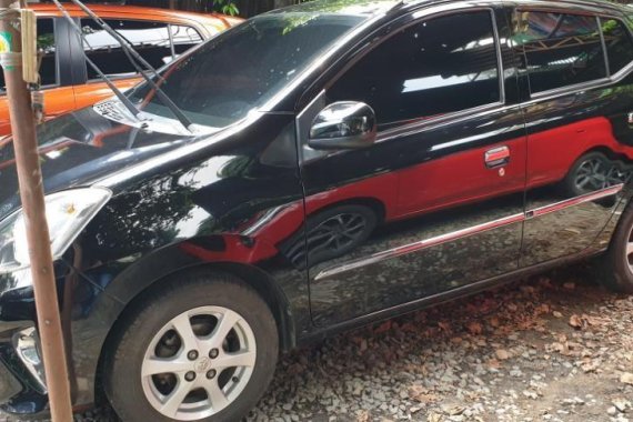 Sell Black 2014 Toyota Wigo at 20000 km in Quezon City