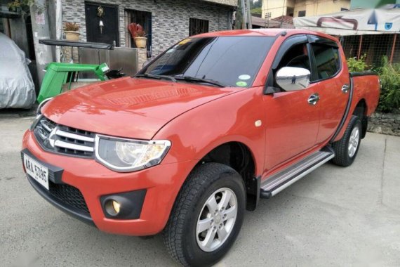 Selling Red Mitsubishi Strada 2014 at 49000 km in Quezon City