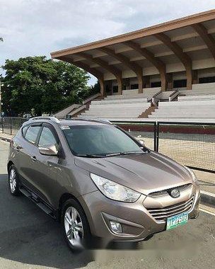 Selling Brown Hyundai Tucson 2011 Automatic Gasoline at 83000 km in Quezon City