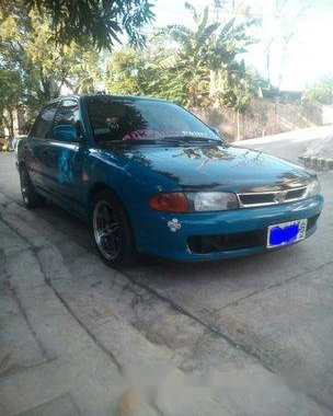 Selling Blue Mitsubishi Lancer 1995 at 161219 km in Quezon City