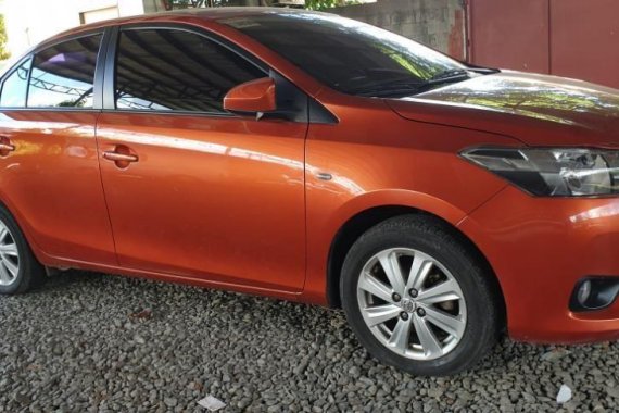 Orange Toyota Vios 2015 at 10000 km for sale in Quezon City