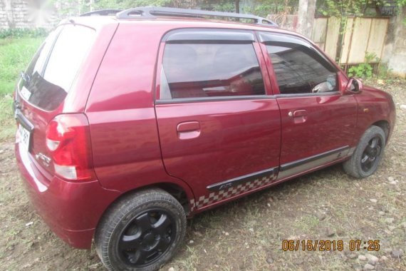 Maroon Suzuki Alto 2013 Manual for sale 