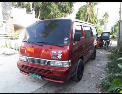 Red Nissan Urvan 2010 for sale in Pagsanjan